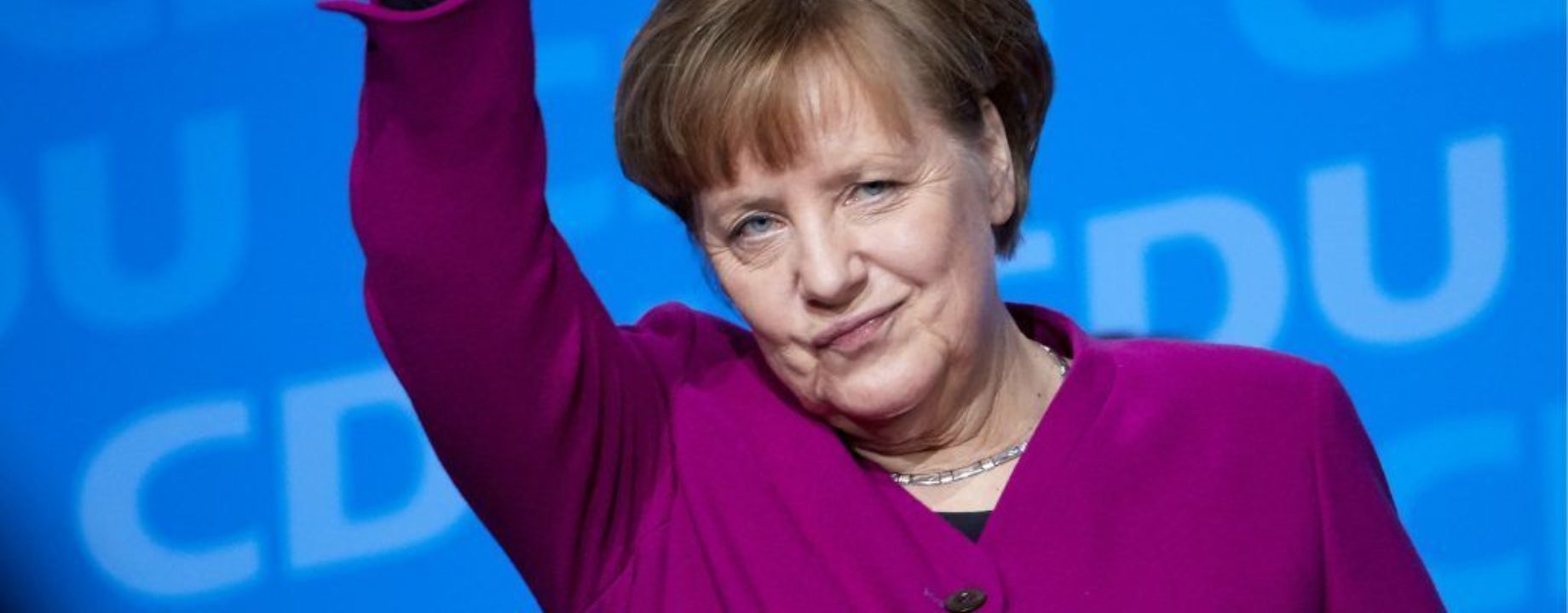 Merkel waving 1024x576