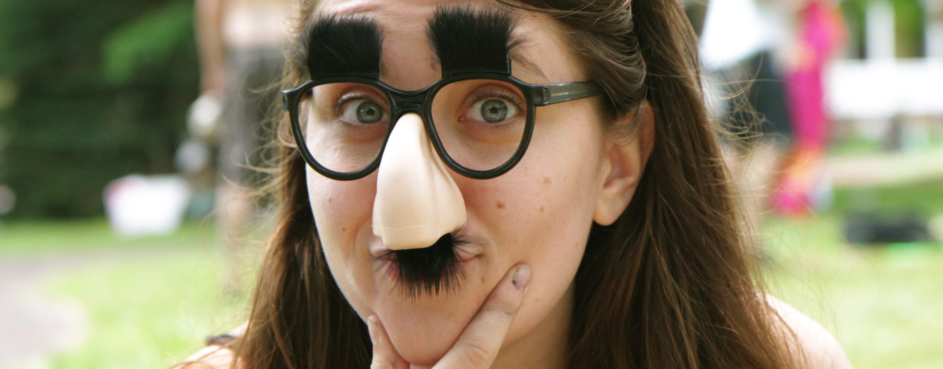 Woman wearing Groucho Marx glasses